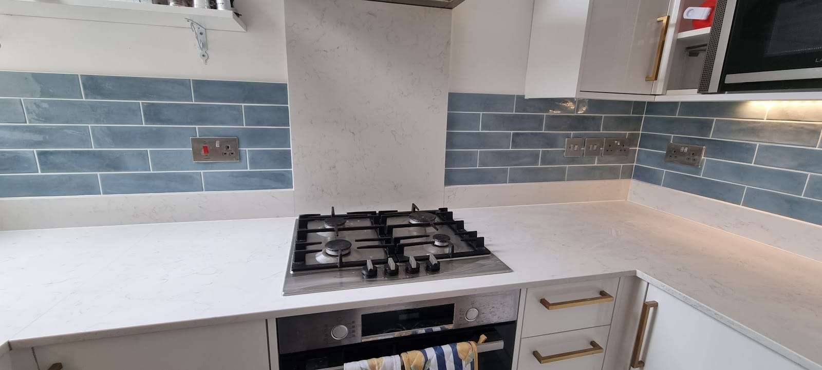 Blue metro splashback, by Roman Tiling Services